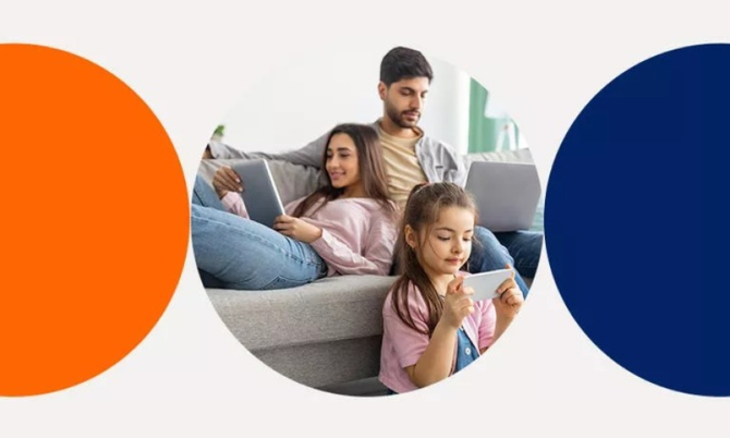 Family relaxing with phones