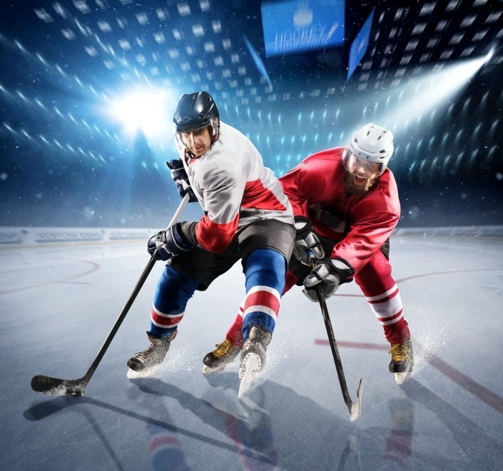 An image depicting two people playing ice hockey, used for the TV Packages section.