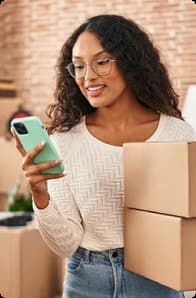 Person carrying moving boxes