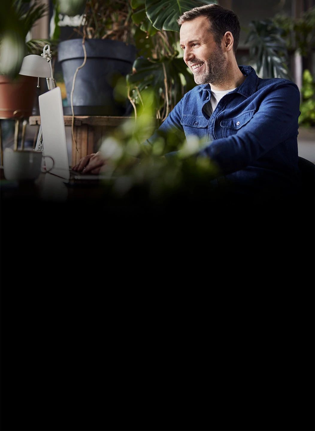 Small business owner managing services via Optimum Business self-service portal
