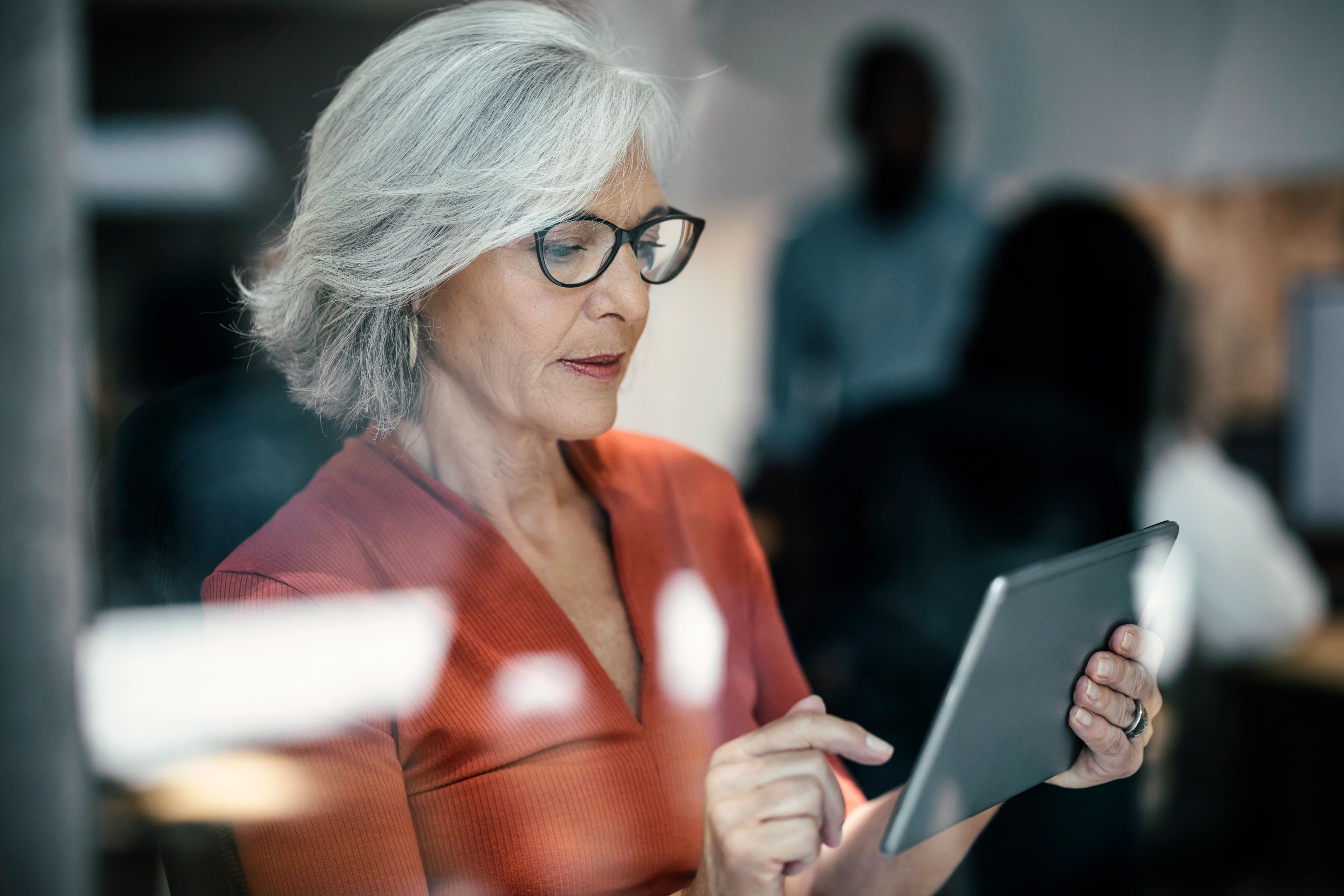 Woman looking at iPad.