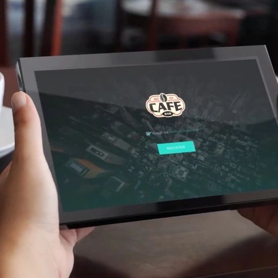 Tablet device with coffee, representing customer insights portal for Pro WiFi.