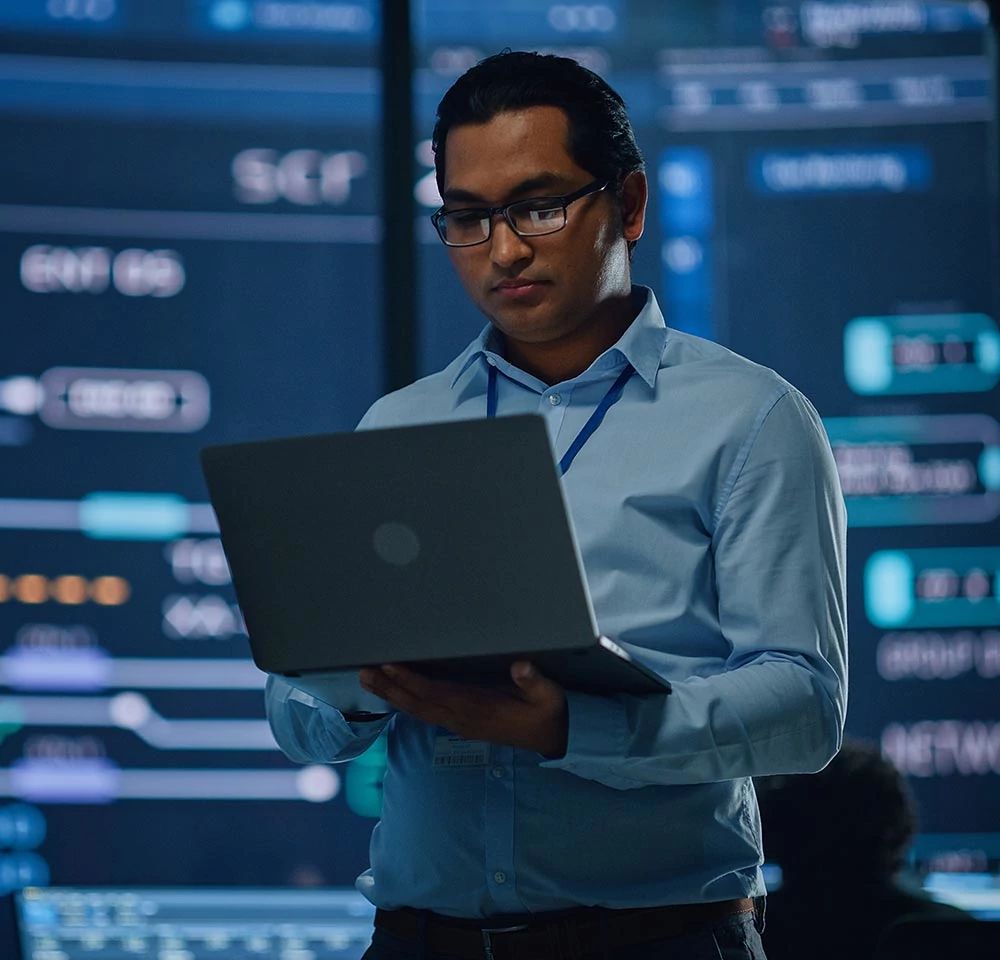 managed-ddos-body-guy-on-computer.jpg