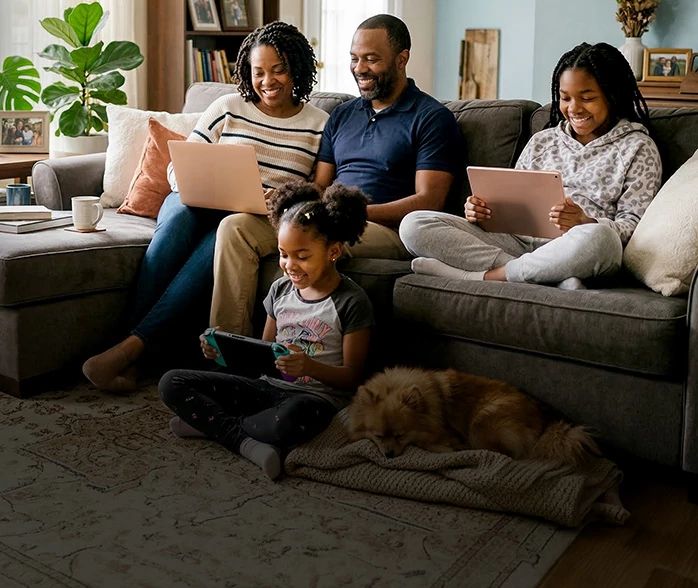 Family with multiple devices after upgrading to Optimum 1 Gig Fiber Internet 3-year price lock