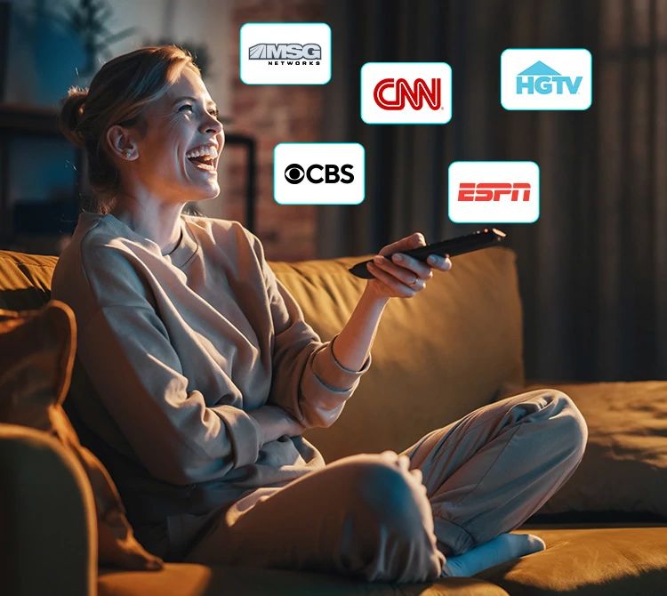 Woman watching TV screen showing live sports and streaming apps via Optimum TV upgrade add-on