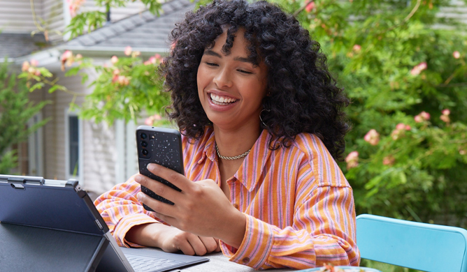 Lady Using Optimum Mobile Phone Outside