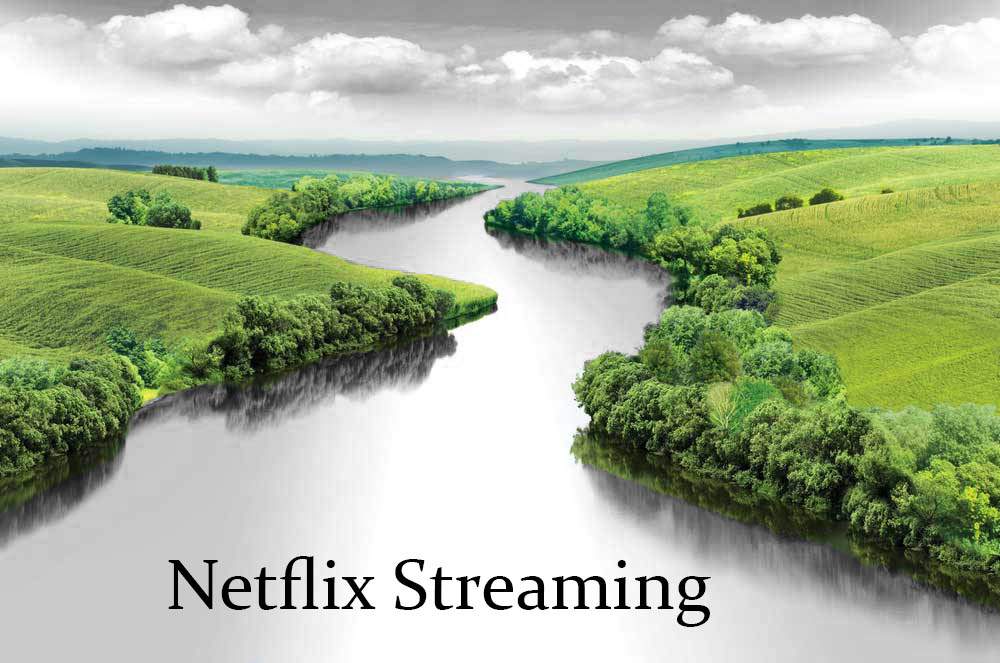 Green grass with gray river with black text overlay that reads "Netflix Streaming."