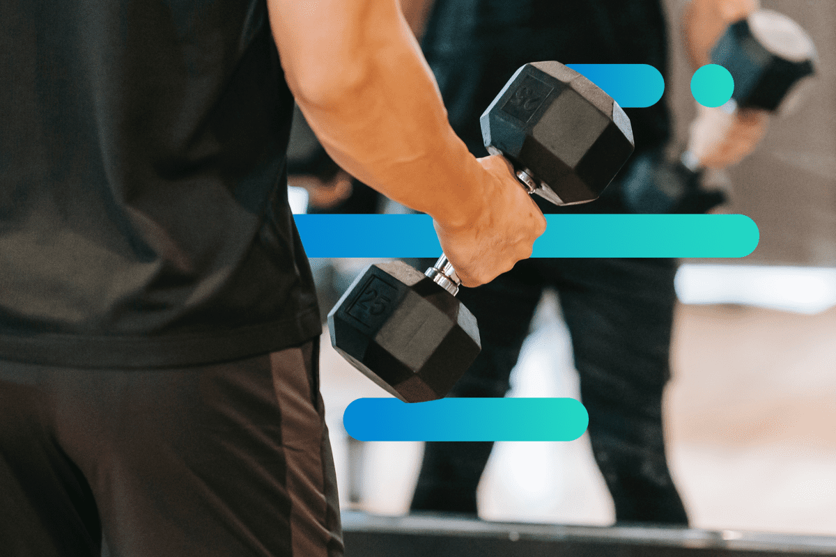 man holding a weight and working out in front of a mirror with blue stripe background